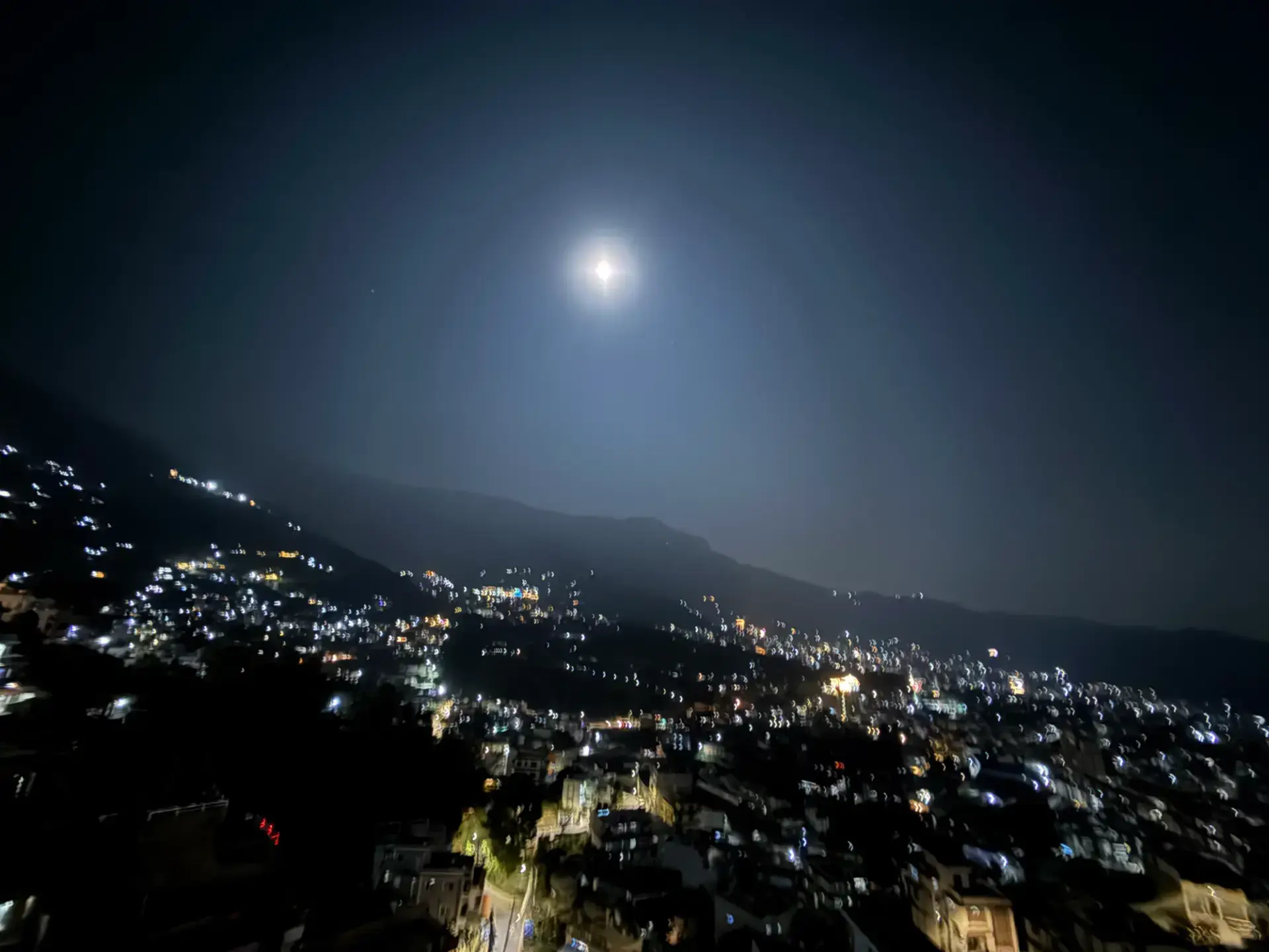 Full moon over the Kathmandu Valley seen from the homestay terrace