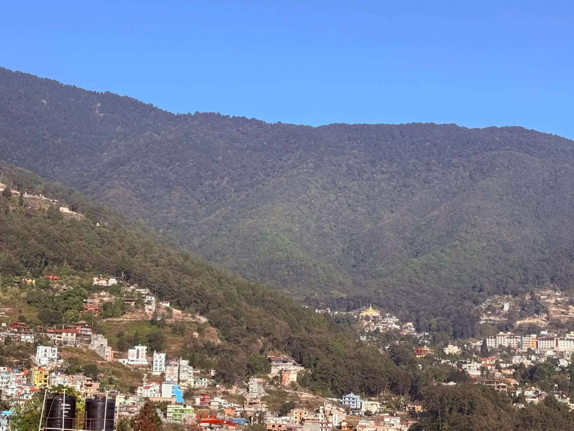 Green Shivapuri National Park hillside above Budhanilkantha on a clear day