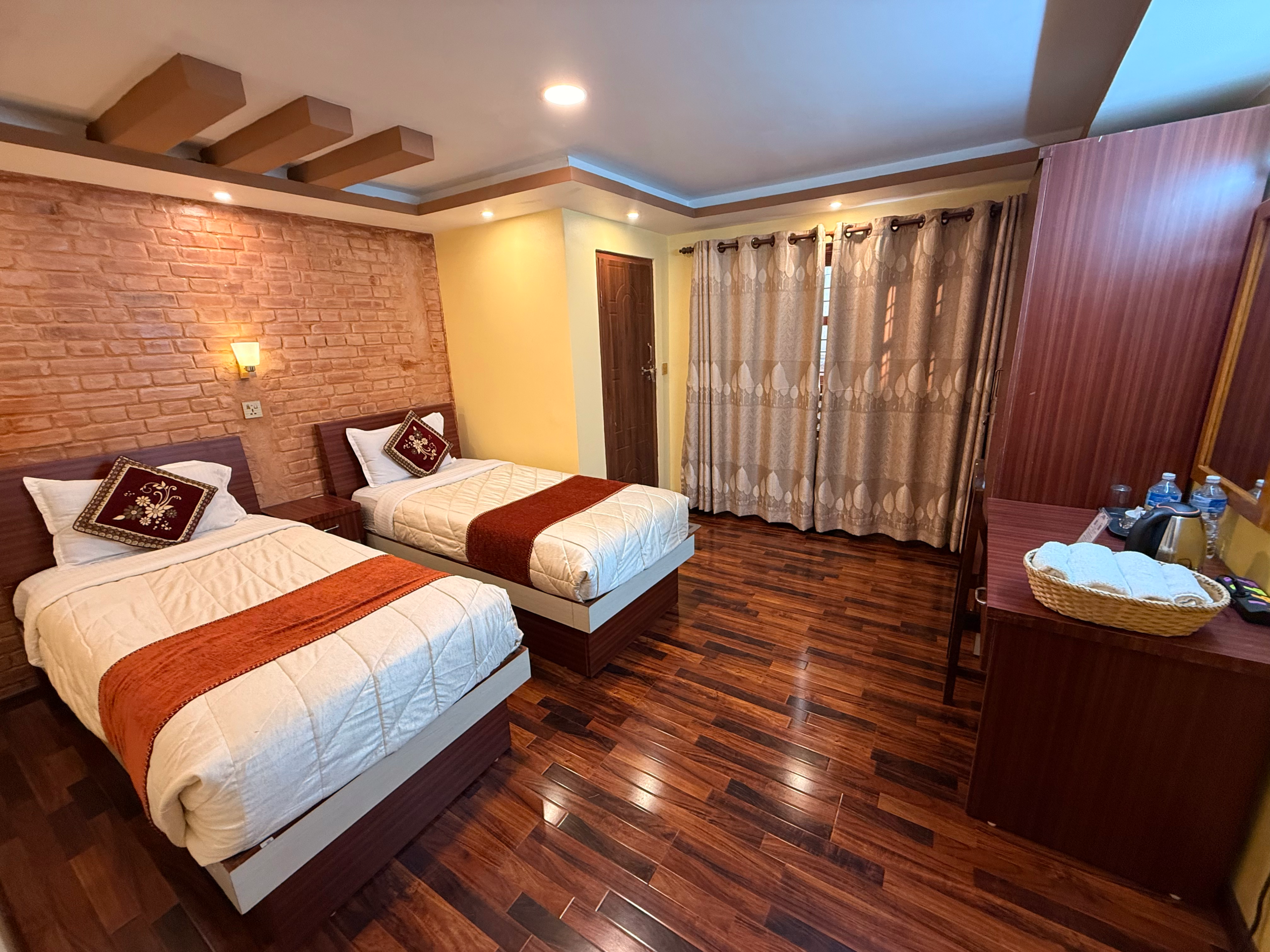 homestay near airport Kathmandu quiet showing clean Deluxe King room for restful stay